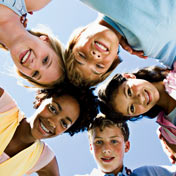 Photo: Kids circle around the camera