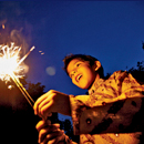 Photo: Boy with a sparkler